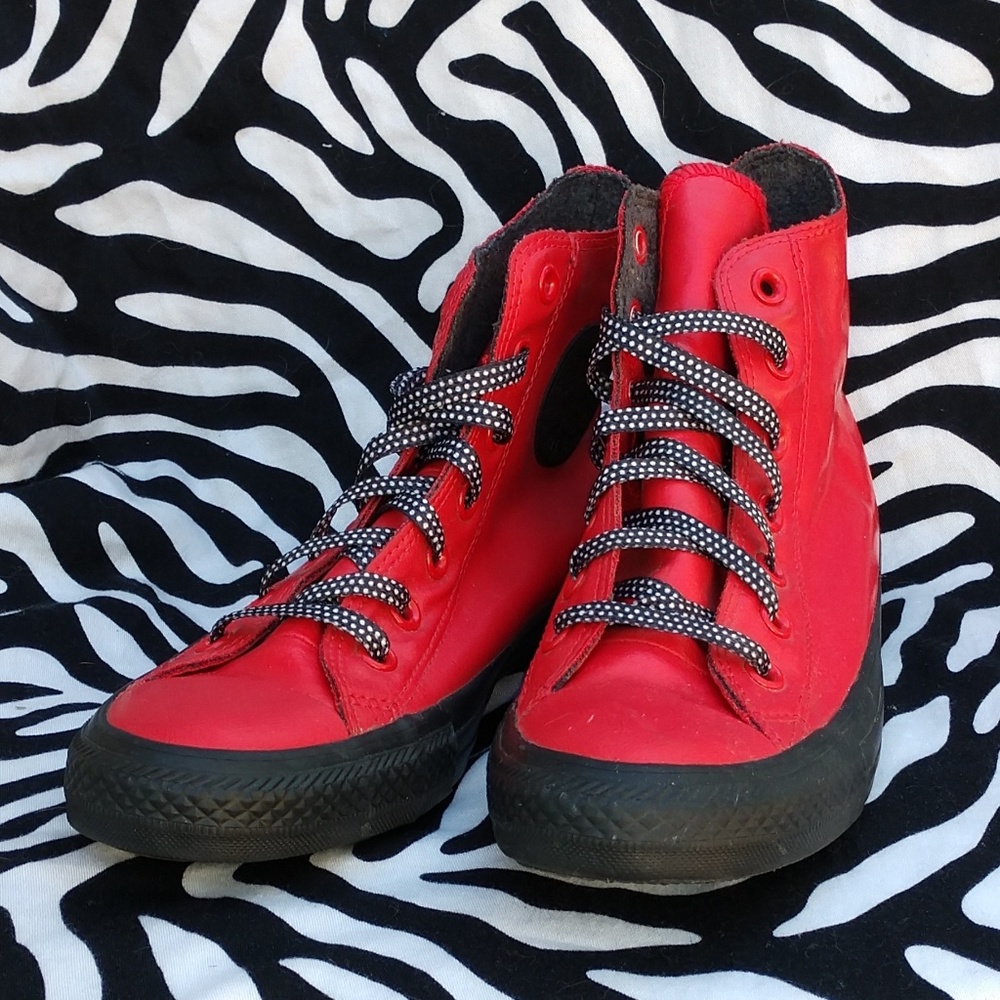 Red rubber coated Converse